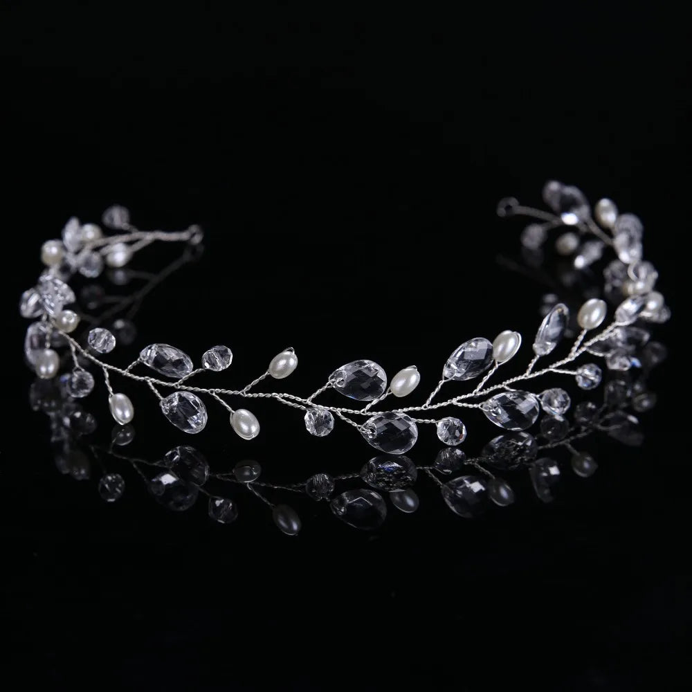 Silver hair vine with beads on a black background