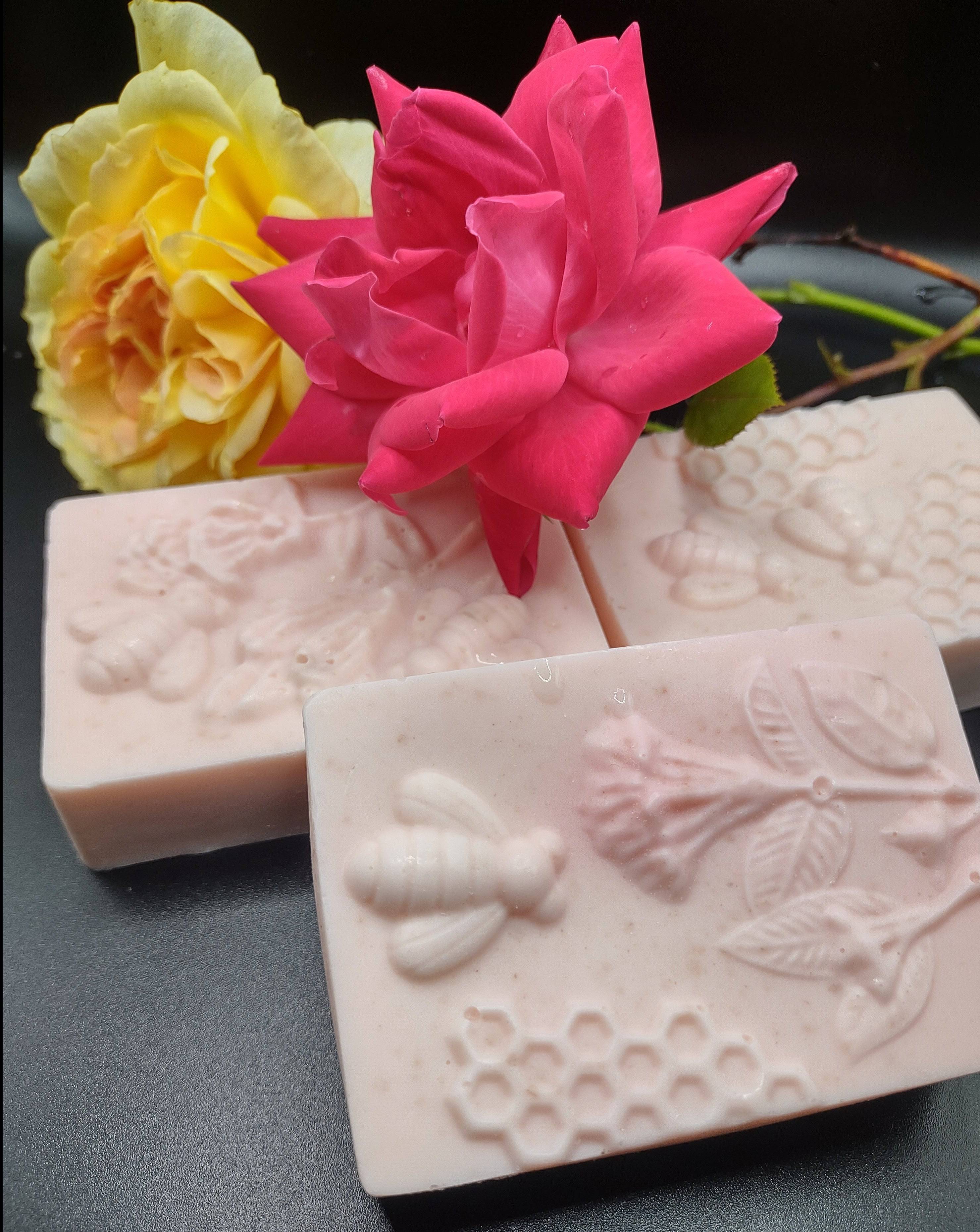 ALMA NATURALS - Cherry Blossom Milk & Honey Oatmeal Soap, three bars are shown with bumble bee and flower motif 