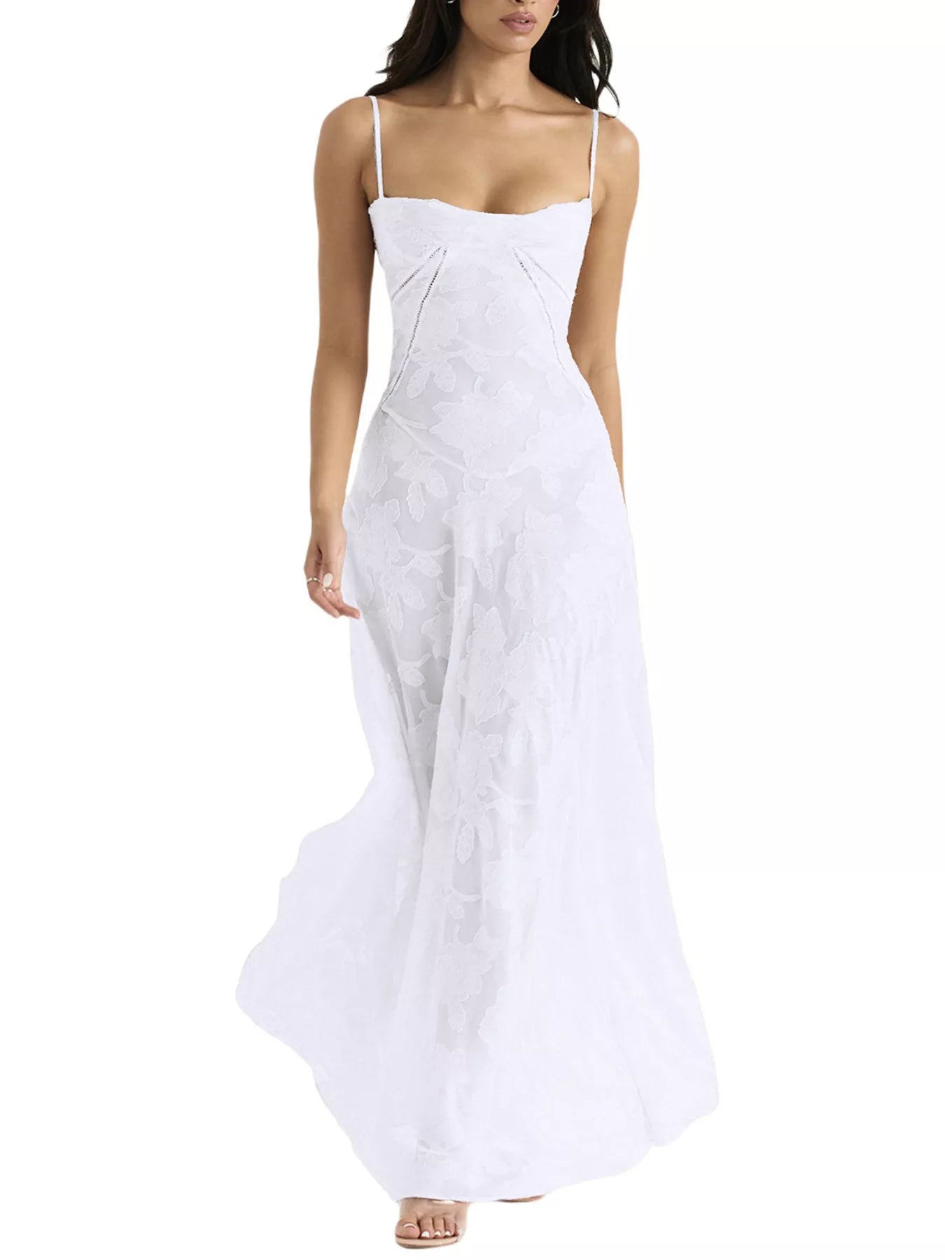 NEWYORKLISTED STYLE COLLECTION: Woman wearing a white dress with thin straps on a white background