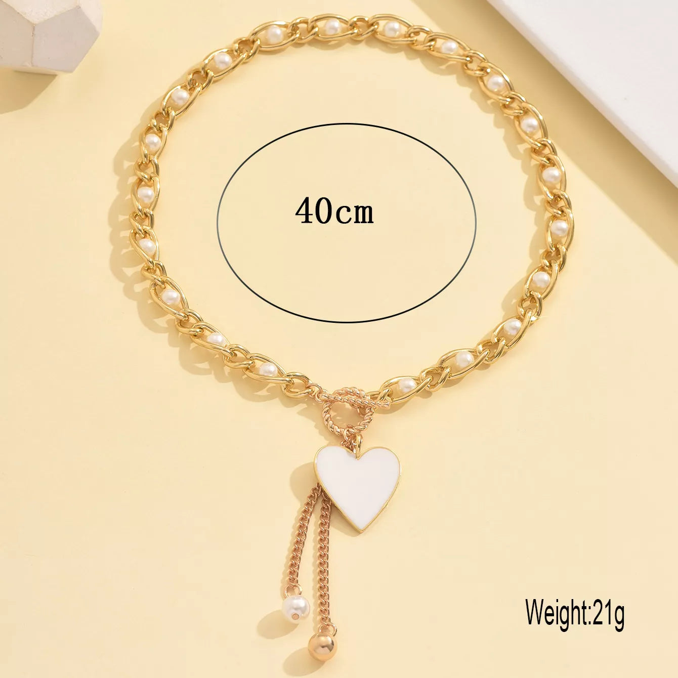 NEWYORKLISTED Glamour Collection: Pearl necklace with heart pendant 