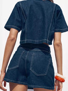 NEWYORKLISTED STYLE COLLECTION: Person wearing a blue denim outfit with a white background