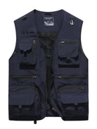 NEWYORKLISTED ATLAS MEN"S COLLECTION: Navy blue vest with multiple pockets and zippers on a white background