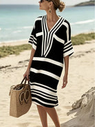 NEWYORKLISTED STYLE COLLECTION: Woman in a black and white striped dress on a beach