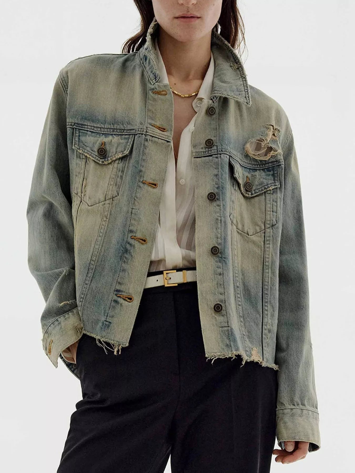 NEWYORKLISTED STYLE COLLECTION: Person wearing a light blue denim jacket on a white background