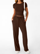 NEWYORKLISTED COMFORT COLLECTION: Woman wearing a brown outfit with a white background