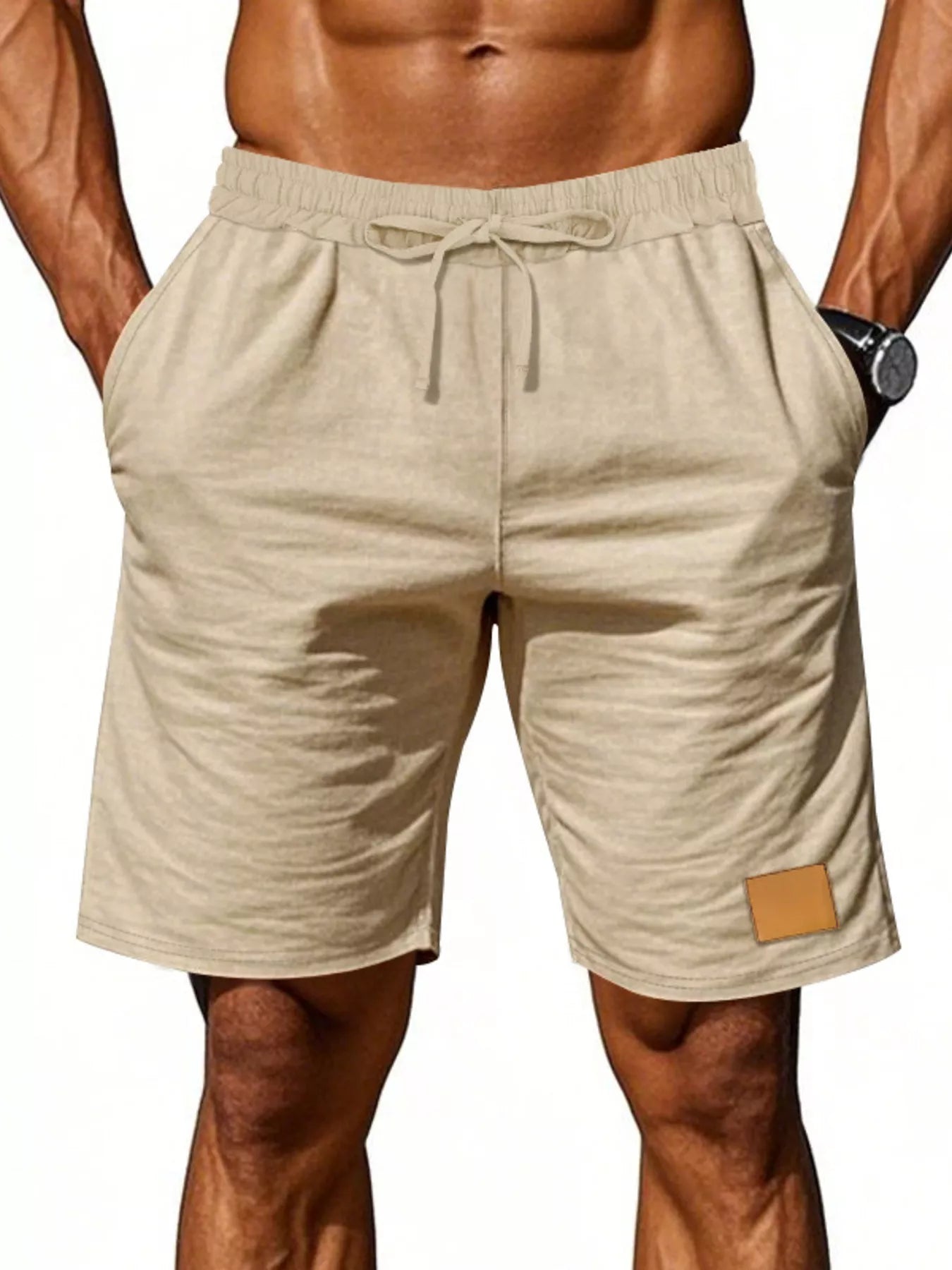 NEWYORKLISTED ATLAS MEN'S COLLECTION: Beige shorts with a drawstring on a plain background