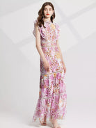 NEWYORKLISTED STYLE COLLECTION: Woman wearing a floral dress on a white background