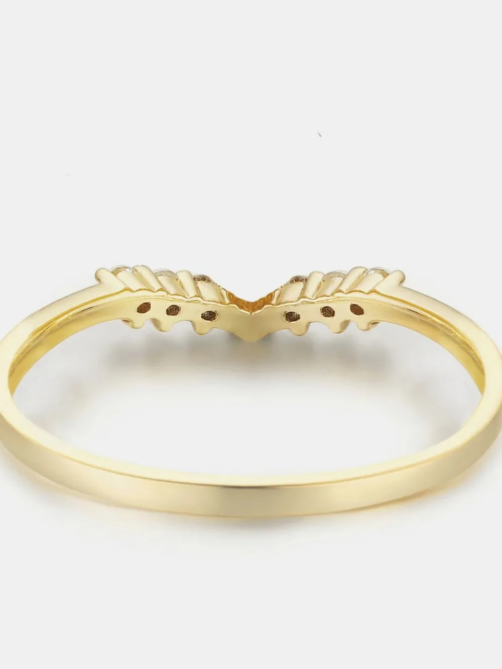 NEWYORKLISTED Valentine's Day Specials: Gold ring with a unique design on a white background