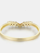 NEWYORKLISTED Valentine's Day Specials: Gold ring with a unique design on a white background